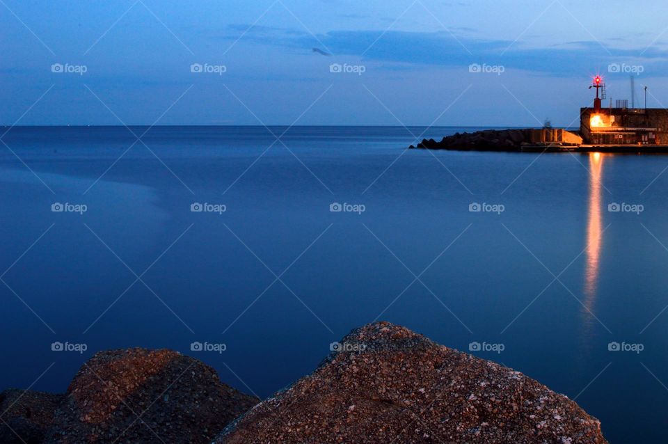 calm blue sea at the port