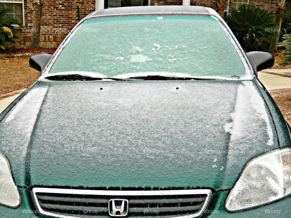 Winter Beginnings - Frozen car completely covered in ice after freak Florida ice storm