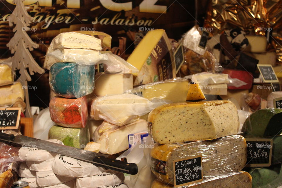 various types of cheese on display