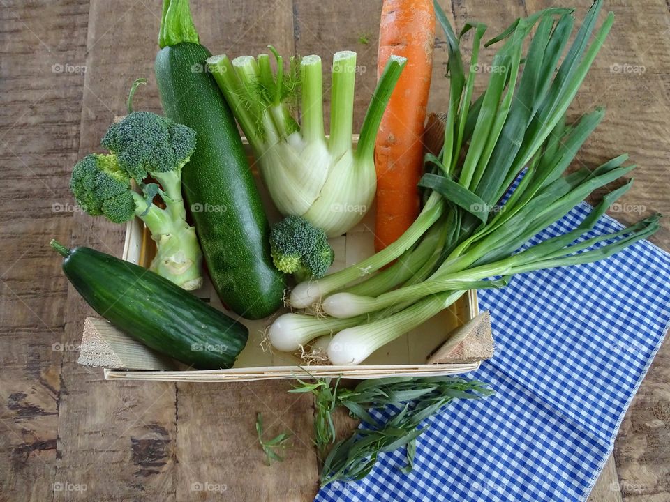 Wooden box with vegetables