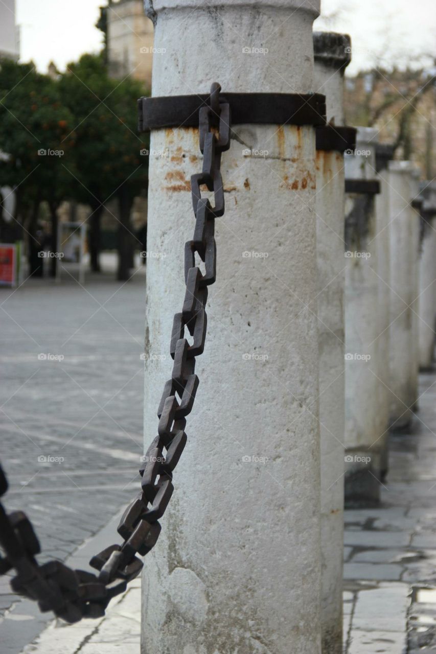 Seville, Spain chain and pillars
