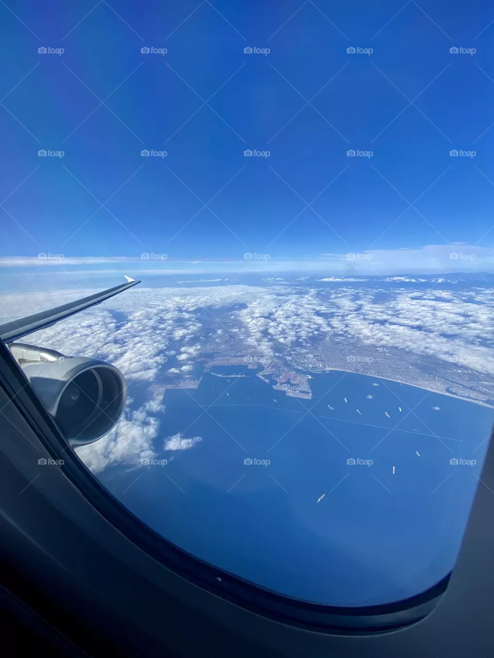 American Airlines Airbus A321 flying over the Port of Long Beach after taking off from Los Angeles International Airport (LAX)