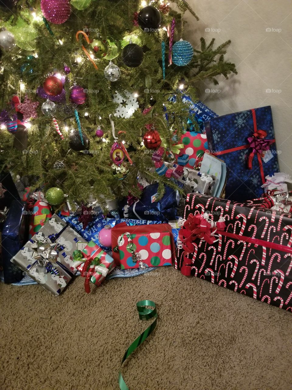 Bottom of the Christmas tree with presents