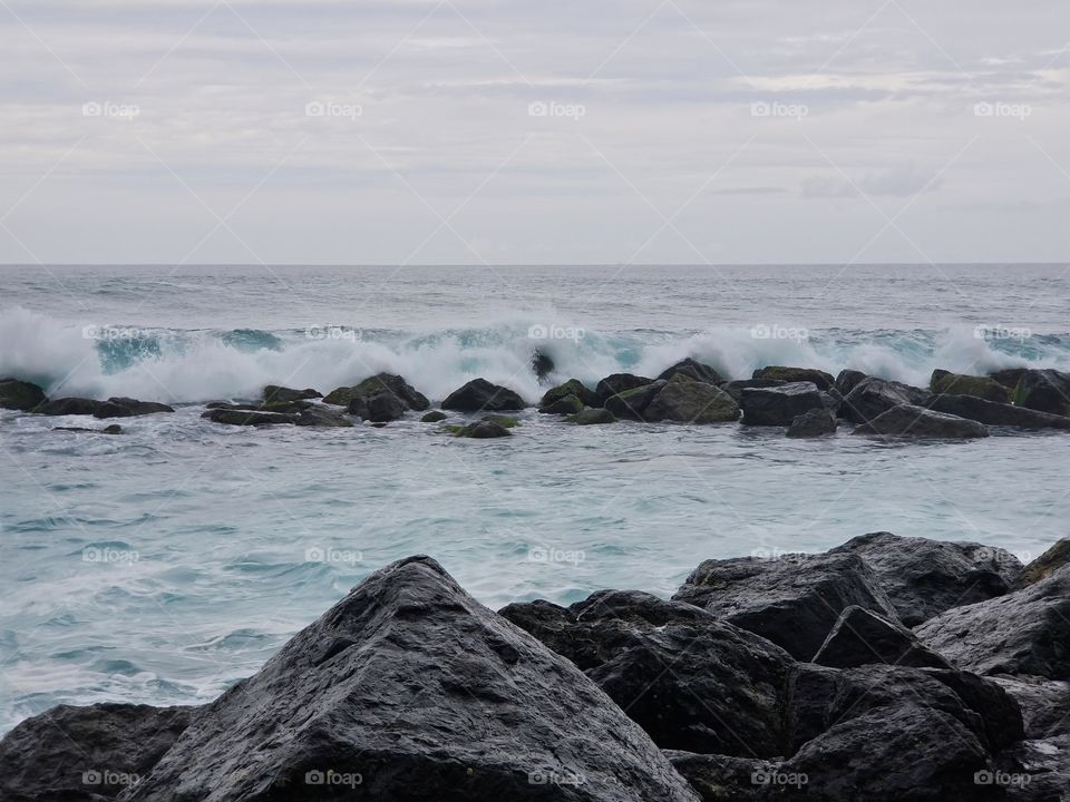 Waves crashing against the rocks