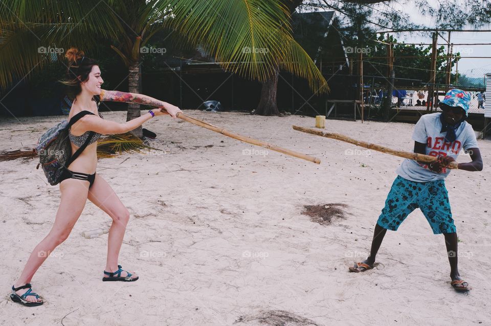 Woman fighting with a african man