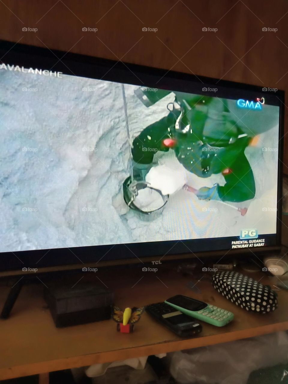WATCHING MOVIE AVALANCHE,, ONE OF THE CHARACTER IS DIGGING SNOW,, THAT LEADS TO THE RESCUE OF THE OTHERS