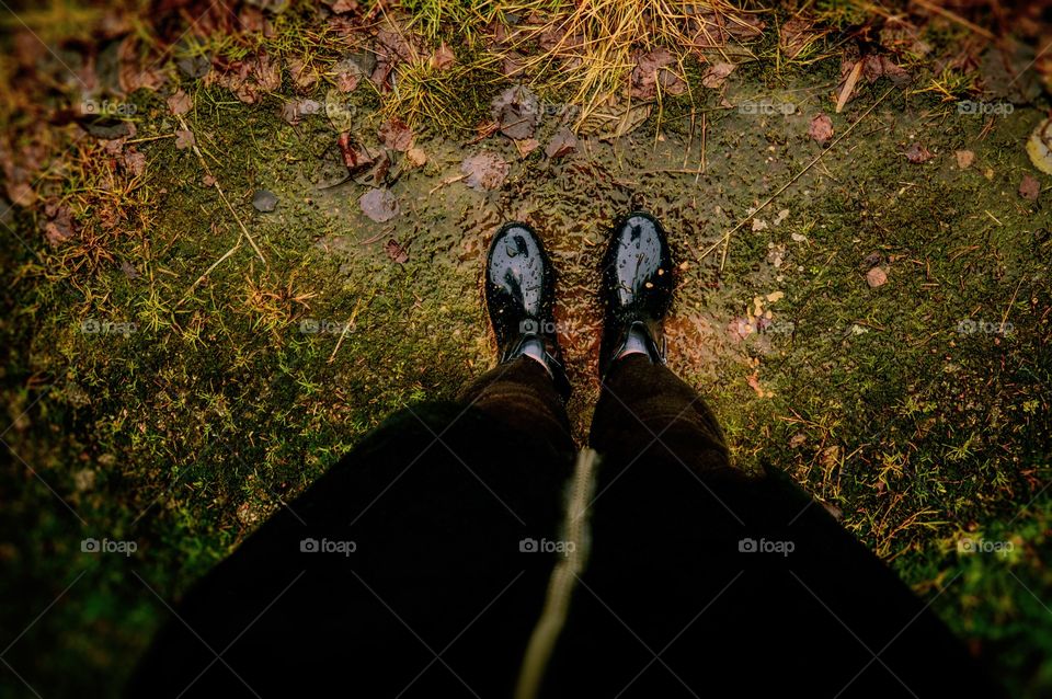 I live at the countryside. Usually during the spring it is very muddy and wet there thats why me and my family are wearing waterproof boots So our feet wont get wet.