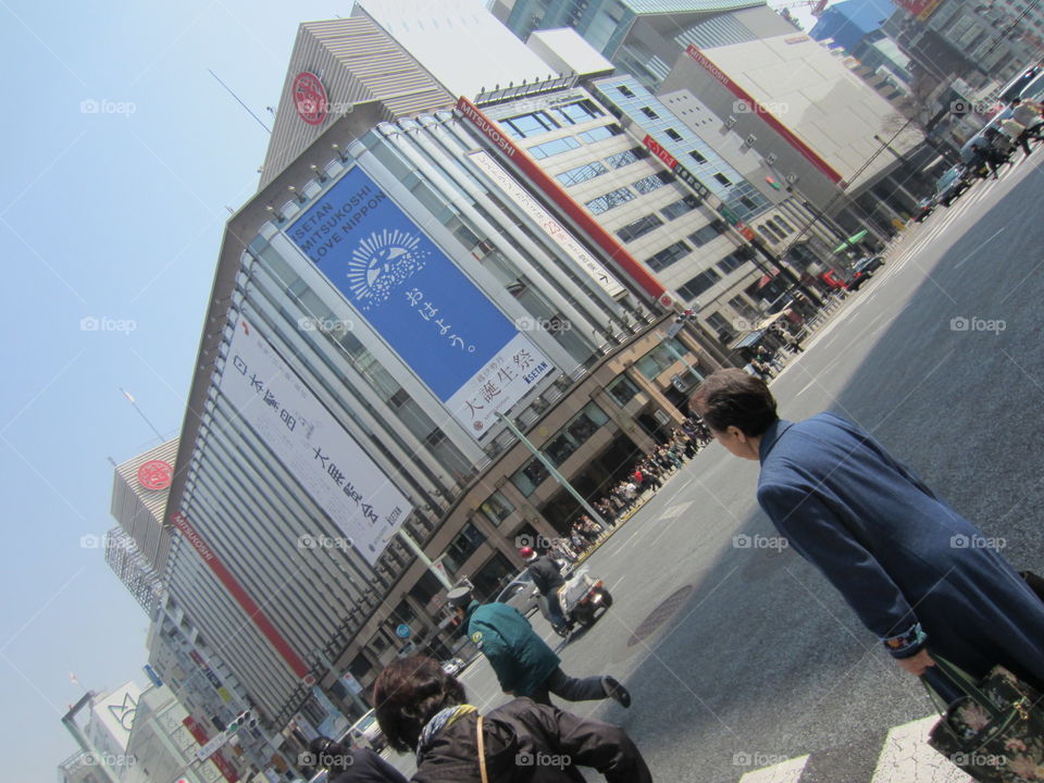 Tokyo, Japan, Street Crossing People and Traffic, Buildings and Billboards