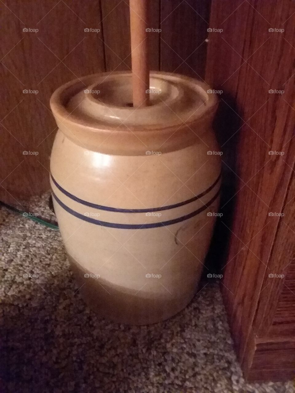 this is an antique butter churn