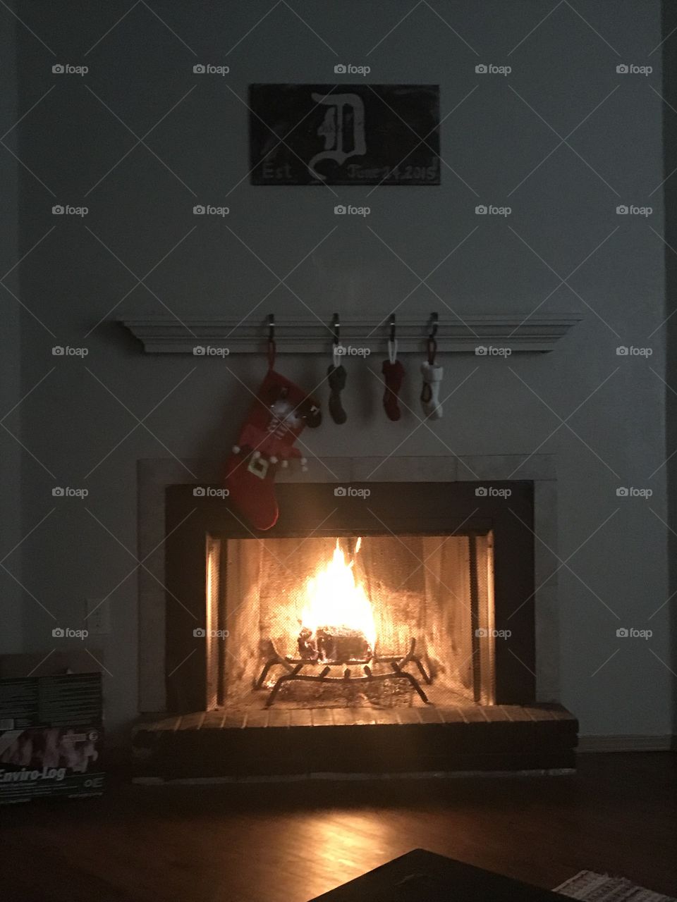 Xmas stockings over fireplace 
