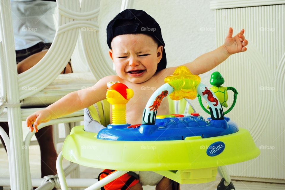 Crying baby in walker