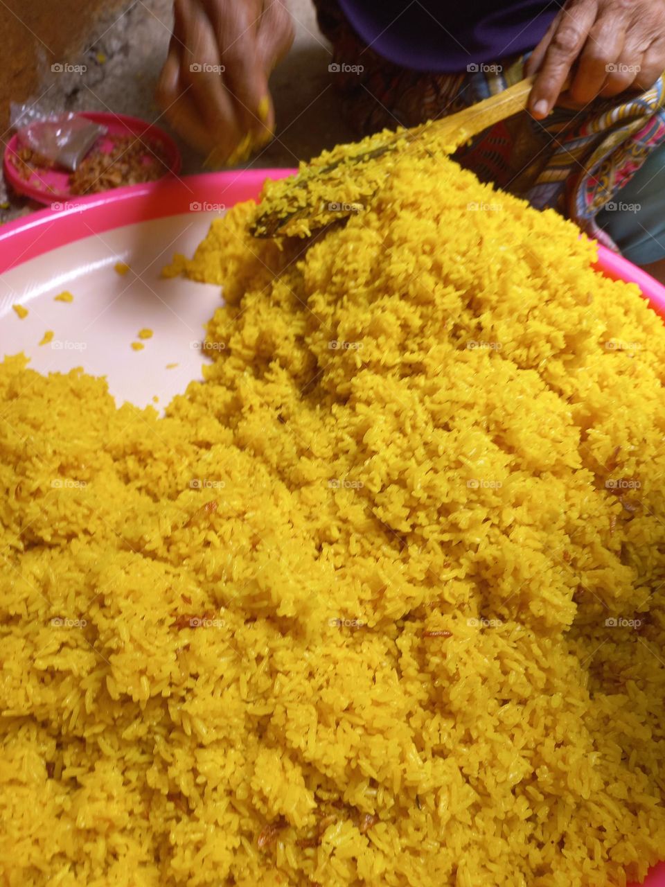 This dish is made from rice cooked together with turmeric and coconut milk and spices