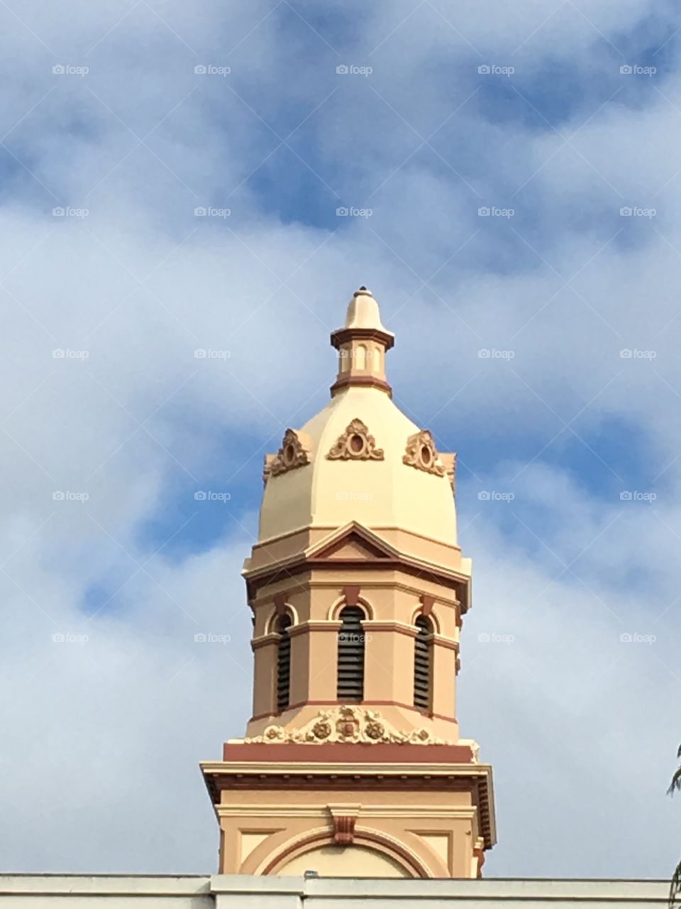 Church steeple against a blue sky