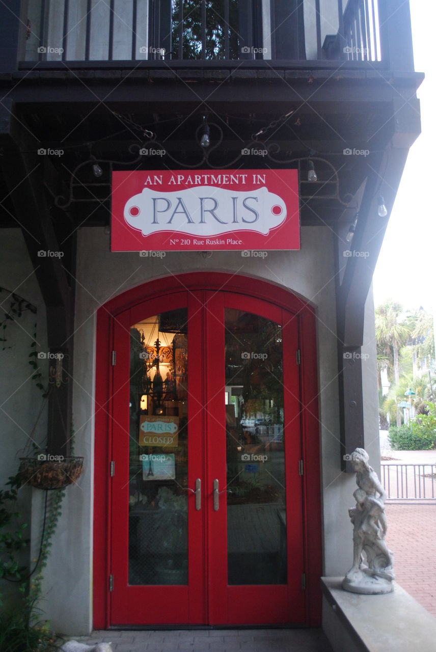 A red door of a store