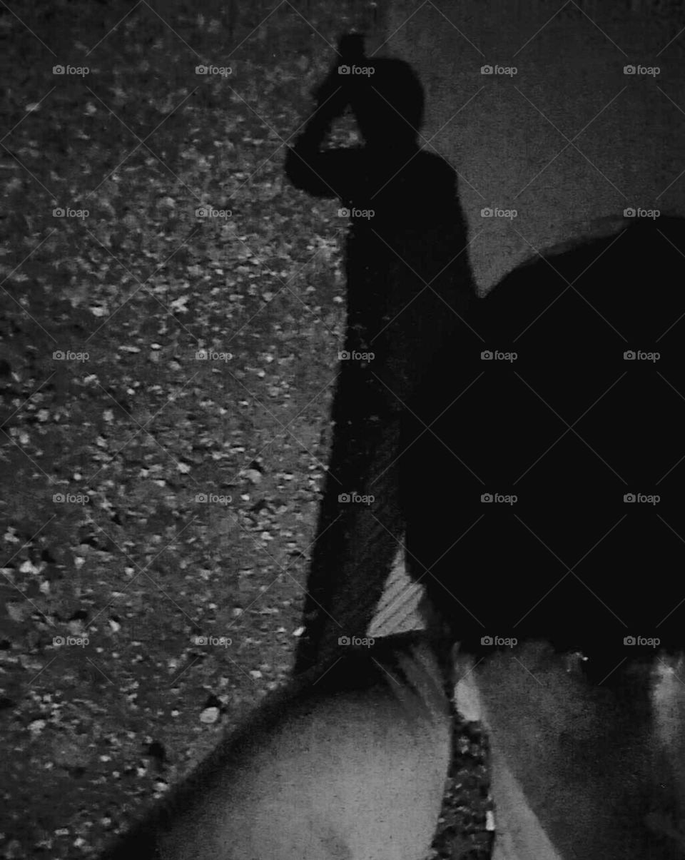 A Shaddowy Figure, on my shoulders 
Who can it be behind me 
Let me, see .  Oh !!  Maybe 
It is me ,  let me think to see 
If that shaddow figure is me. !!