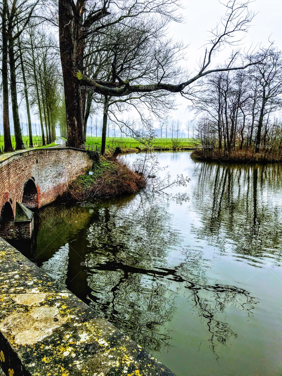 Moat at Castle of Ooidonk near Ghent, Belgium