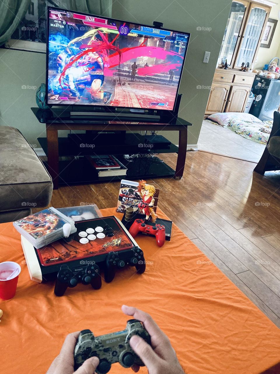 Man playing street fighter video game photography mission 