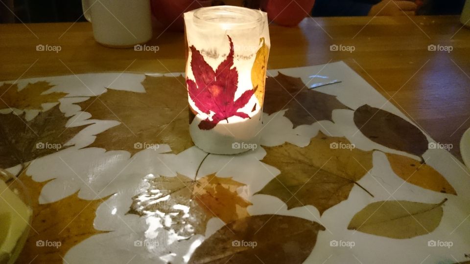 tablecloth and candlelight holder made of leafs