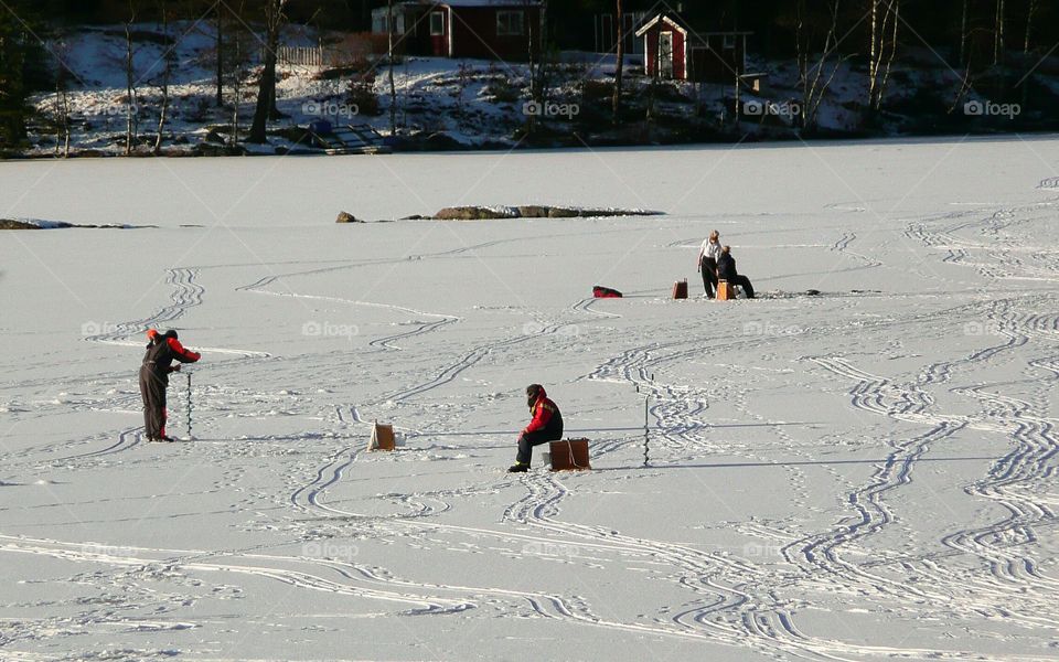 icefishing on a lake