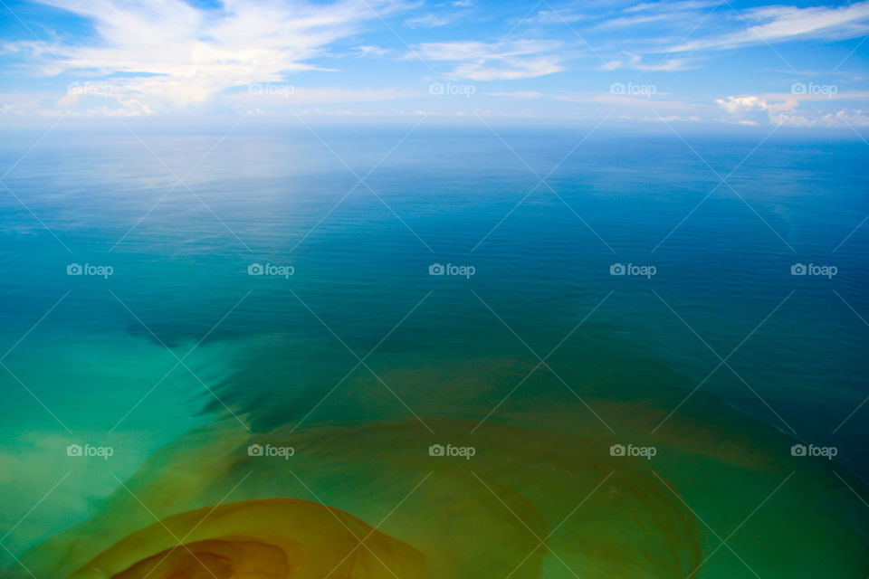 Colors of river water entering ocean