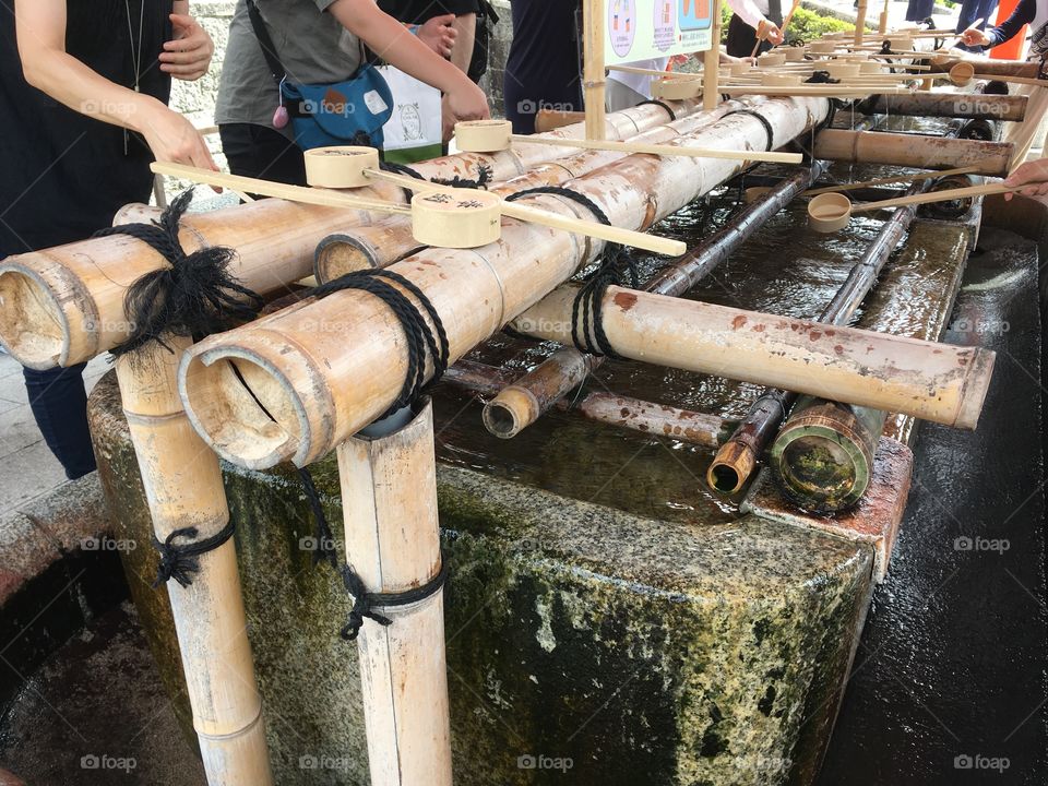 A water ablution pavilion at Fushimi Inari Shrine. Before you enter the shrine you should cleanse yourself. 