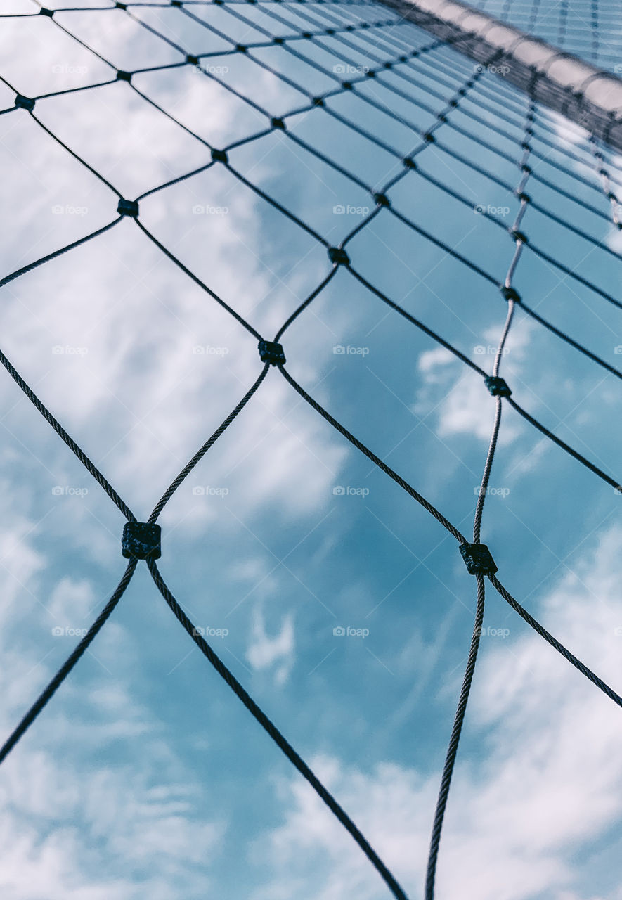 Close-up of a Metalic fence during day 