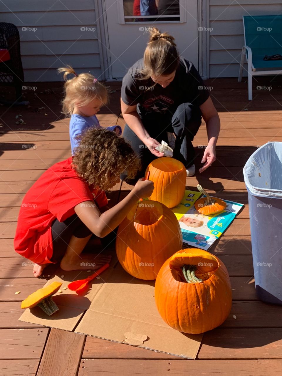 Fun day of pumpkin carving and activities with family and friends getting ready for Halloween 