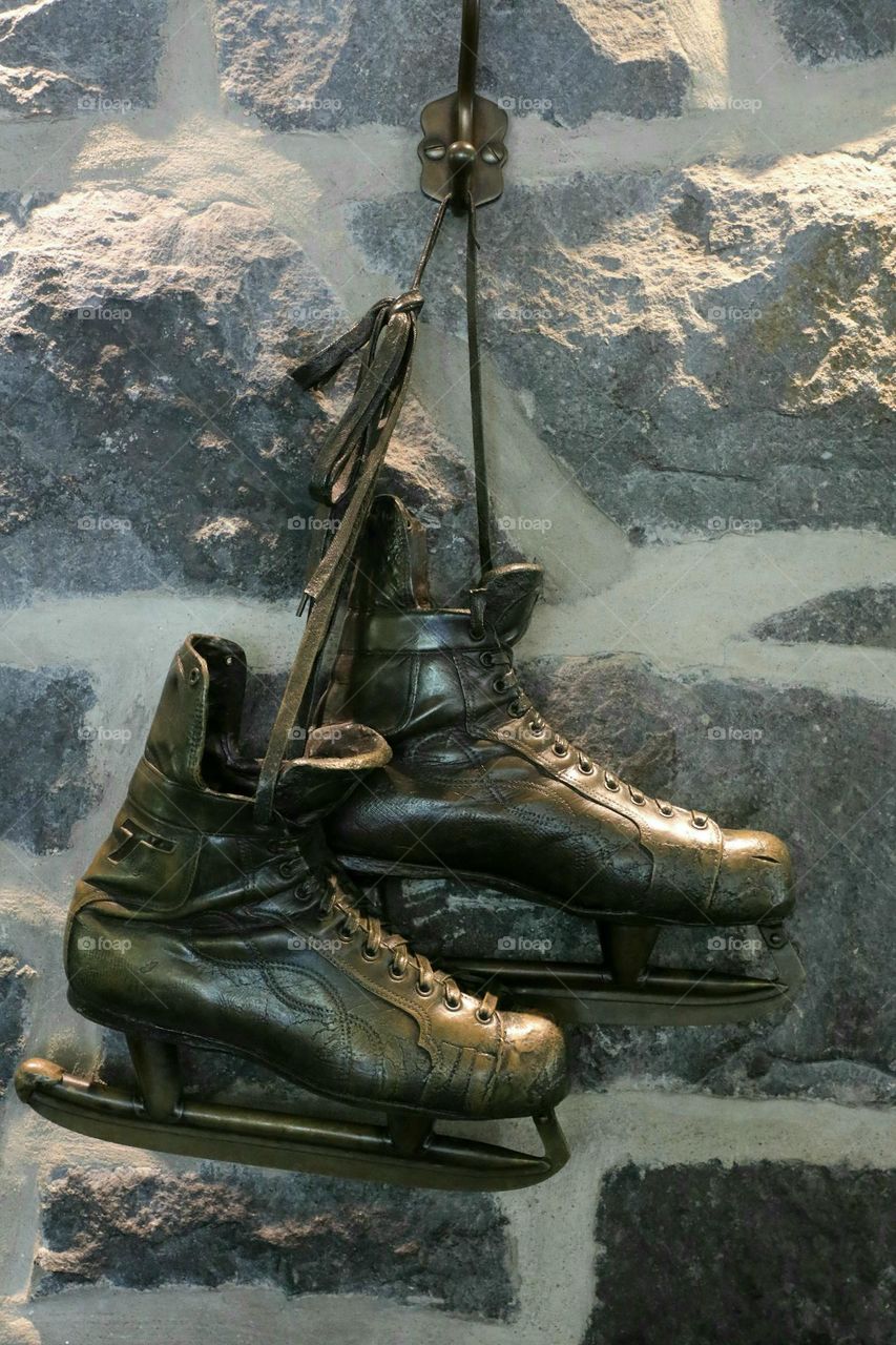 A pair of old hockey shoes