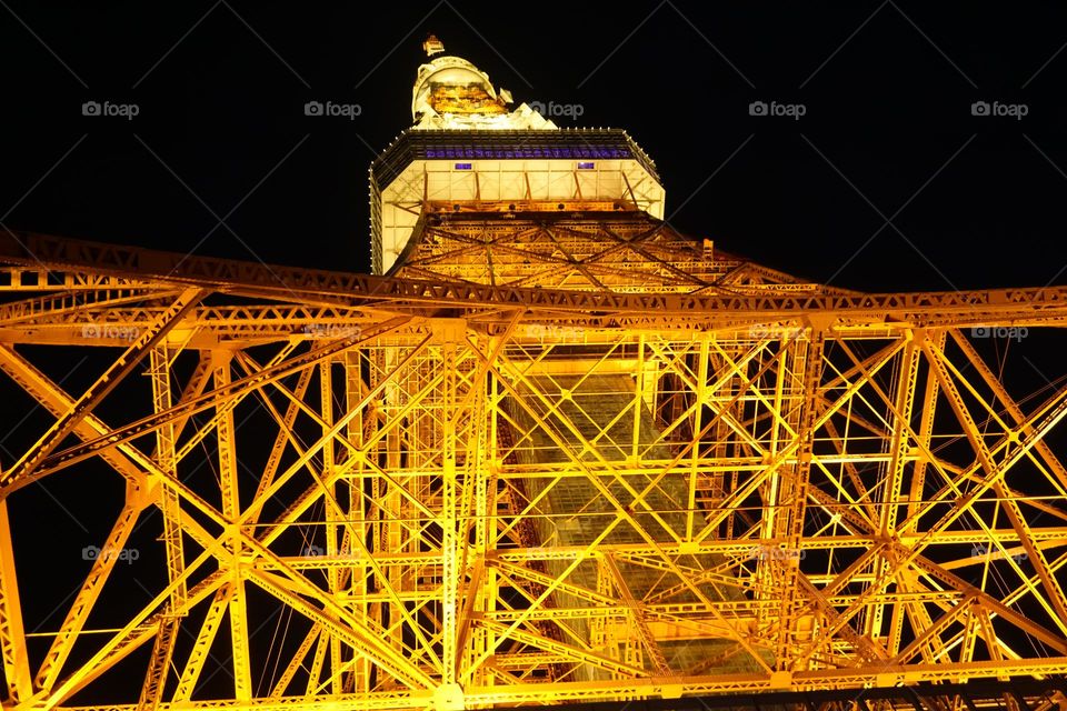 Looking up the Tokyo tower at night