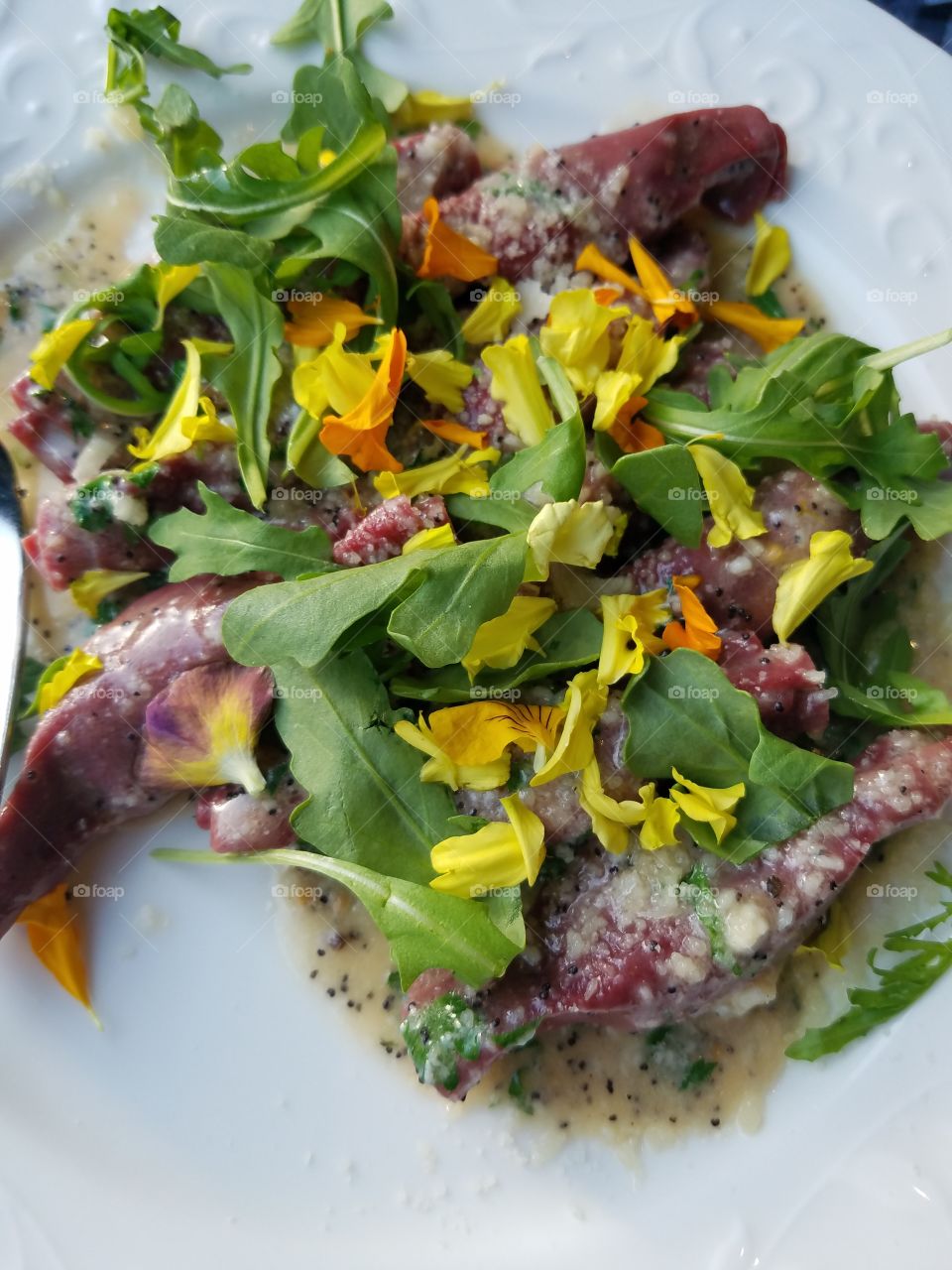 fresh pasta with greens and pansies