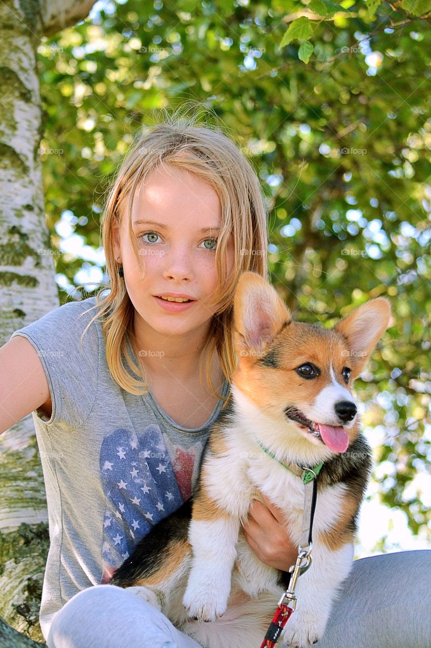 Portrait of girl with dog