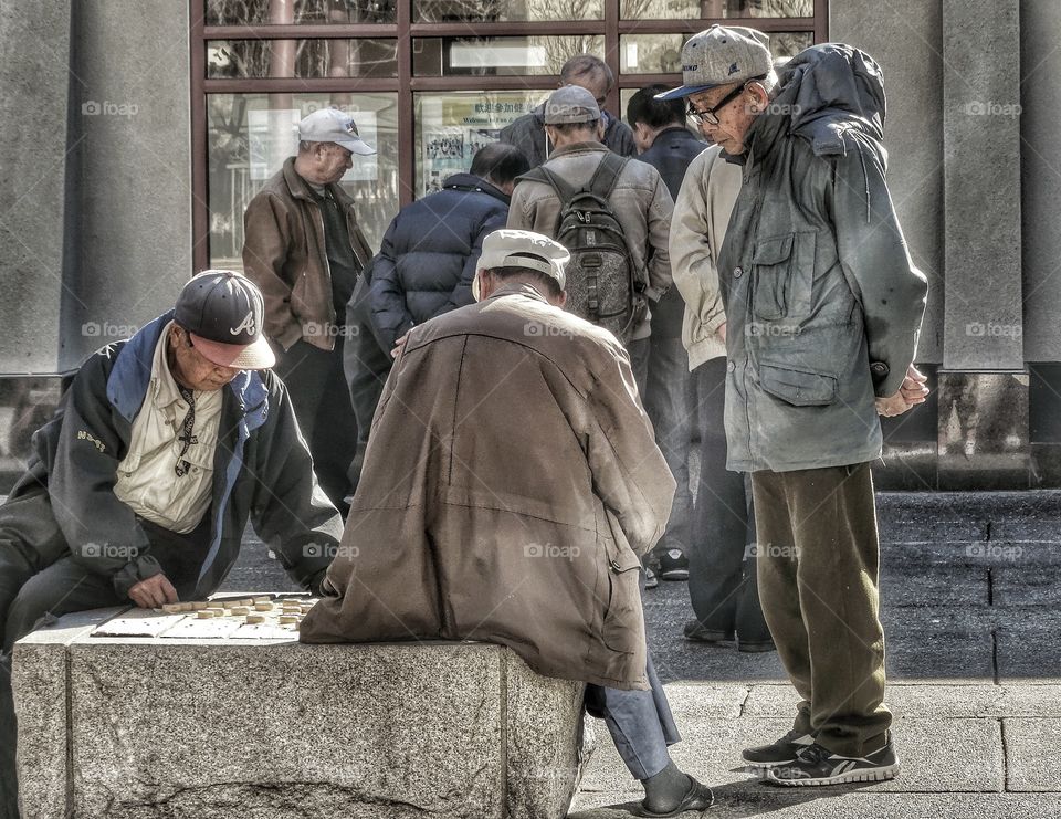 Men Playing Chess Outside 