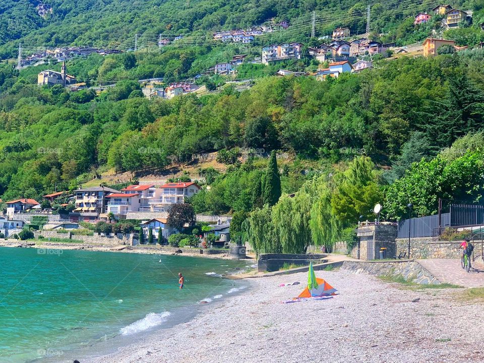 Lake Como.  A small village surrounded by mountains.  View from the beach Gera Lerio