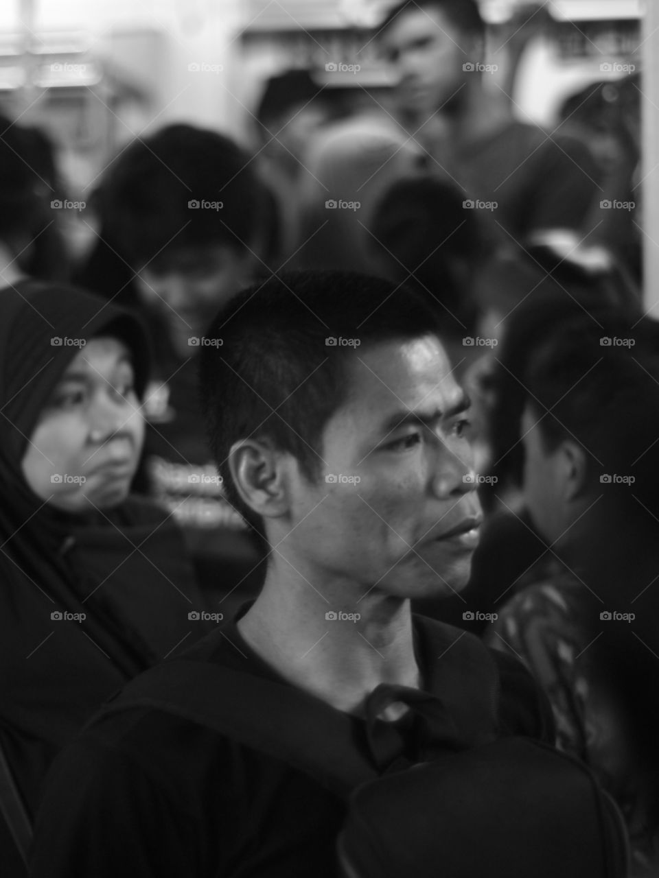 Commuterline passengers expression at Tanah Abang Railway Station, Jakarta