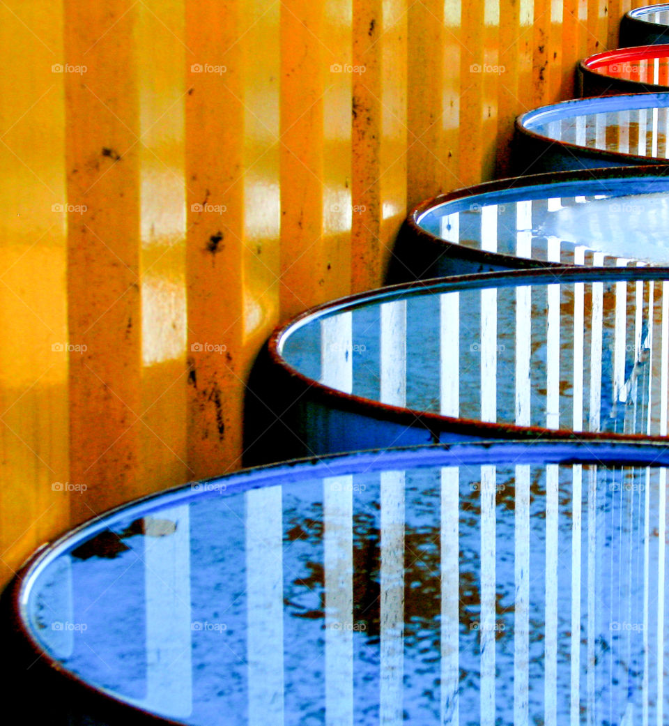 absrraction with blue barrels and light