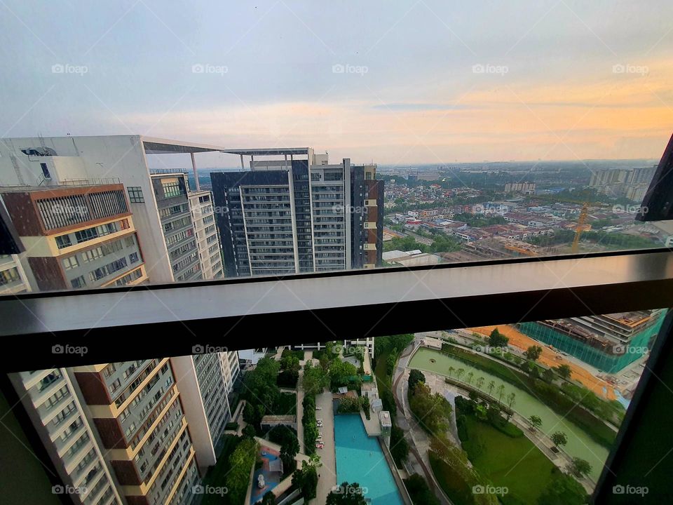 View of Swimming Pool and Man-Made Lake from High Rise Apartment