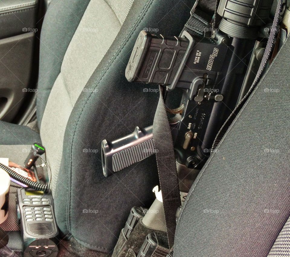 Automatic rifle in a police cruiser