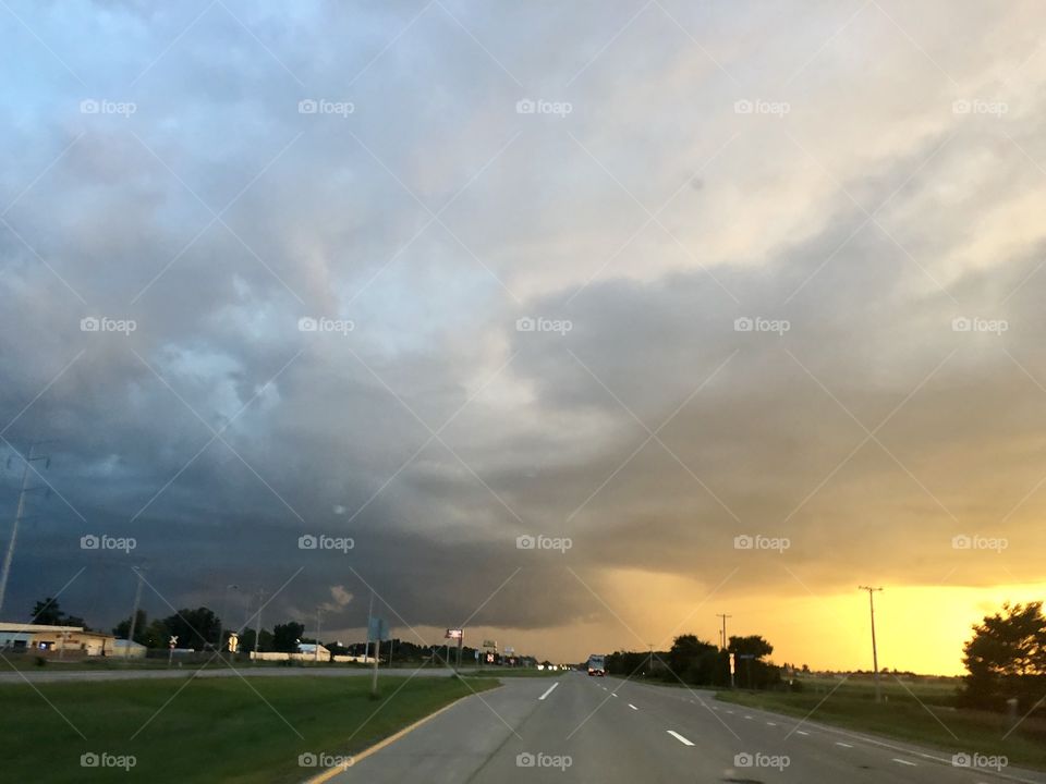 Storm moving in over country skies making for an interesting sunset. I was a Passenger when I took this photo so no worries about driving and being unsafe!!