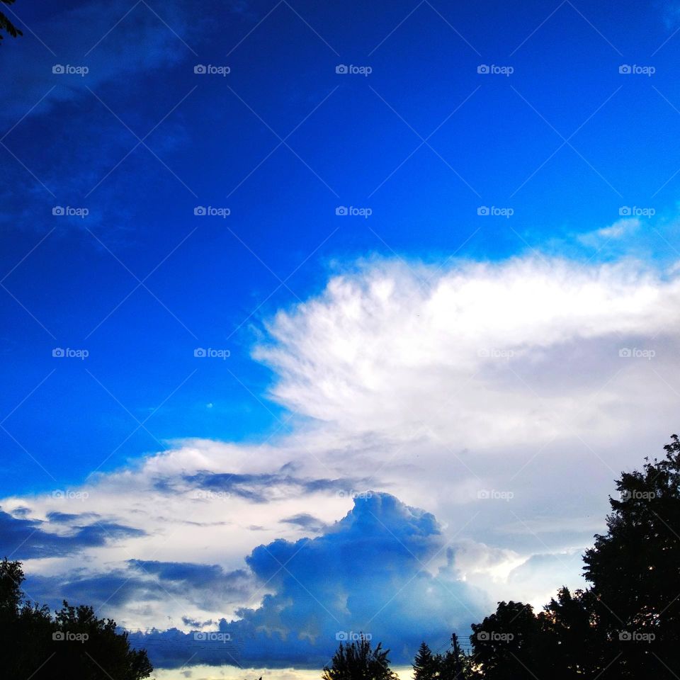 Blue sky, white clouds.