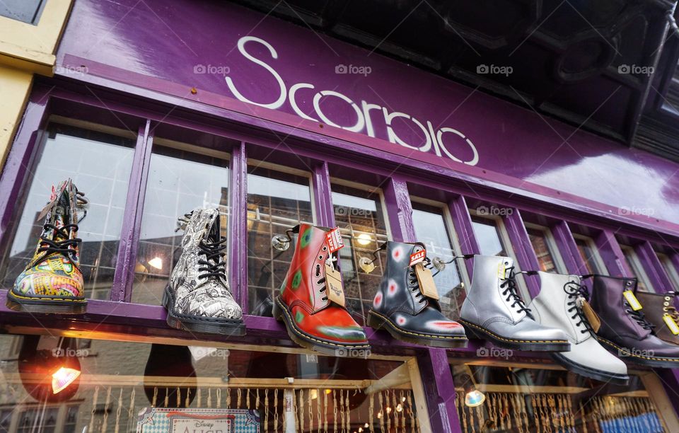 Colourful Doc Martens displayed outside a shop 