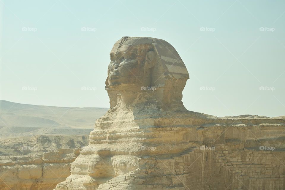 Great Sphinx of Giza. Statue of a mythical creature. Monumental sculpture in Egypt. Most visited Egyptian landmark. Vacation destination. Historic site. Tours and sightseeing