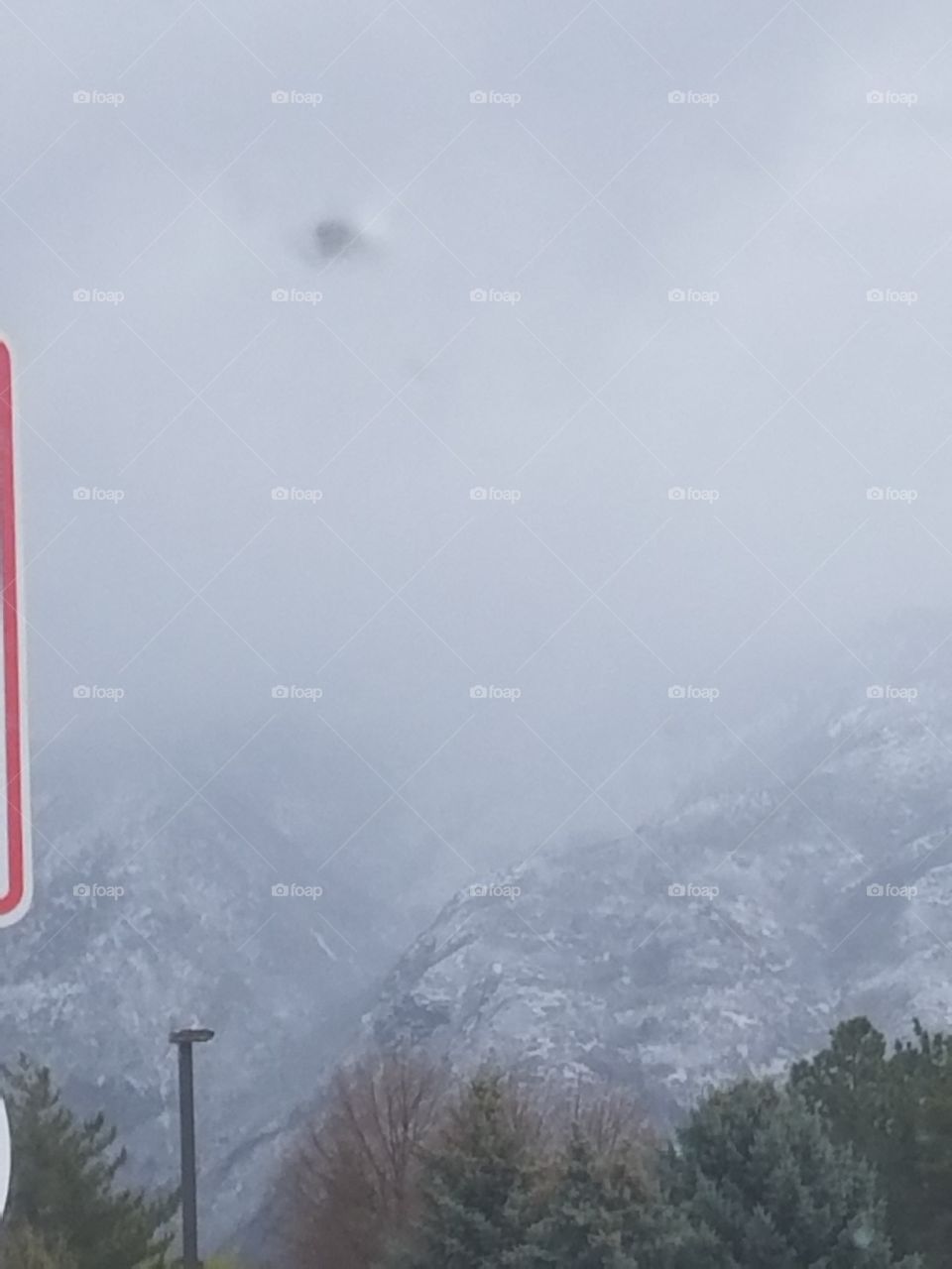 snowing on the rocky mountains