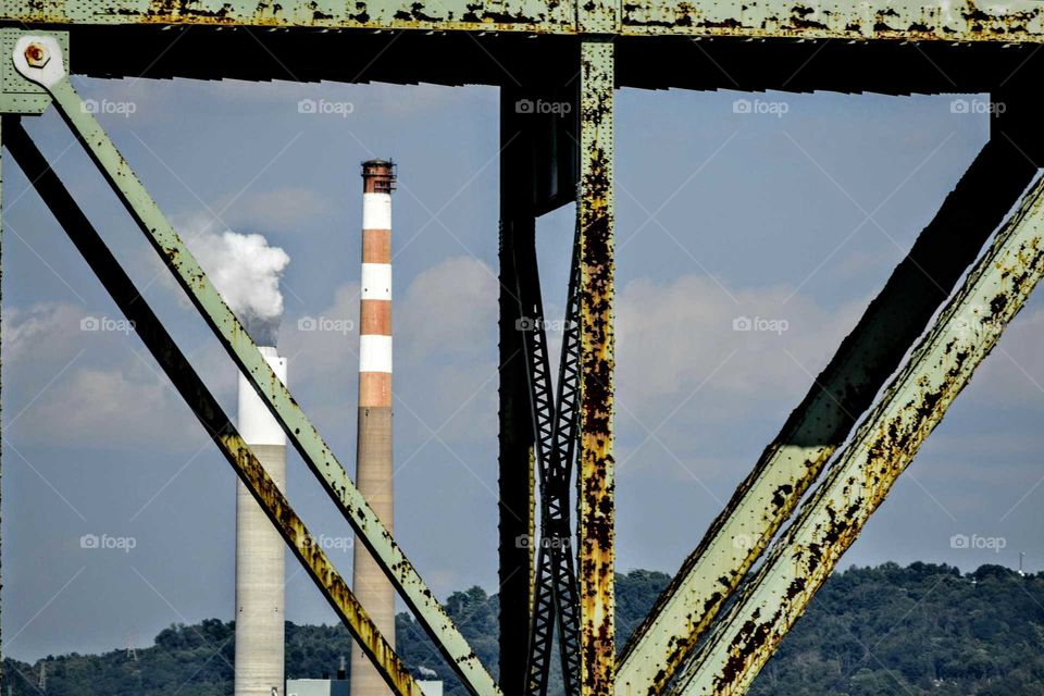 Smoke Stacks Through Bridge