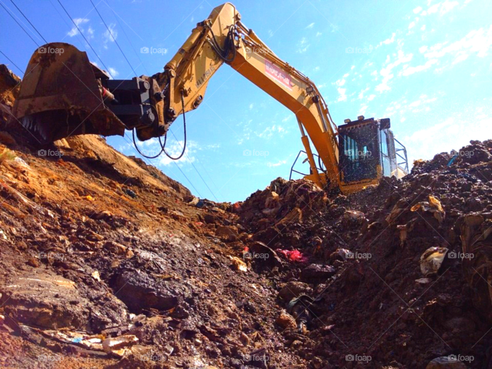 machine excavating digging bucket by clandra