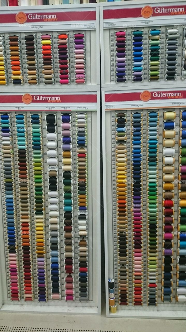store shopping thread needle crafts art colors bright aisle sew