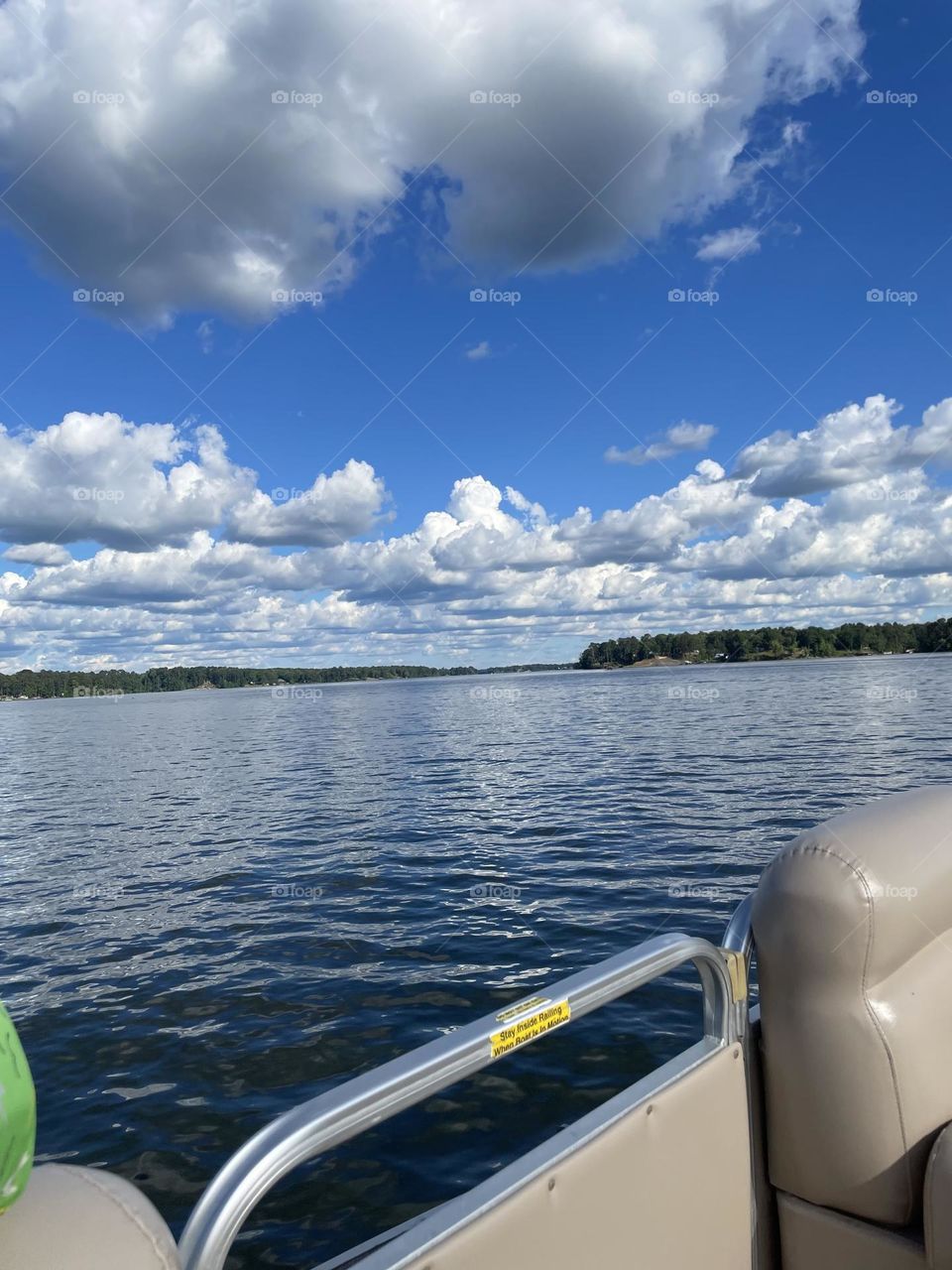 Summer boat rides in without a gray cloud in the sky, feeling the sun and wind in your face 