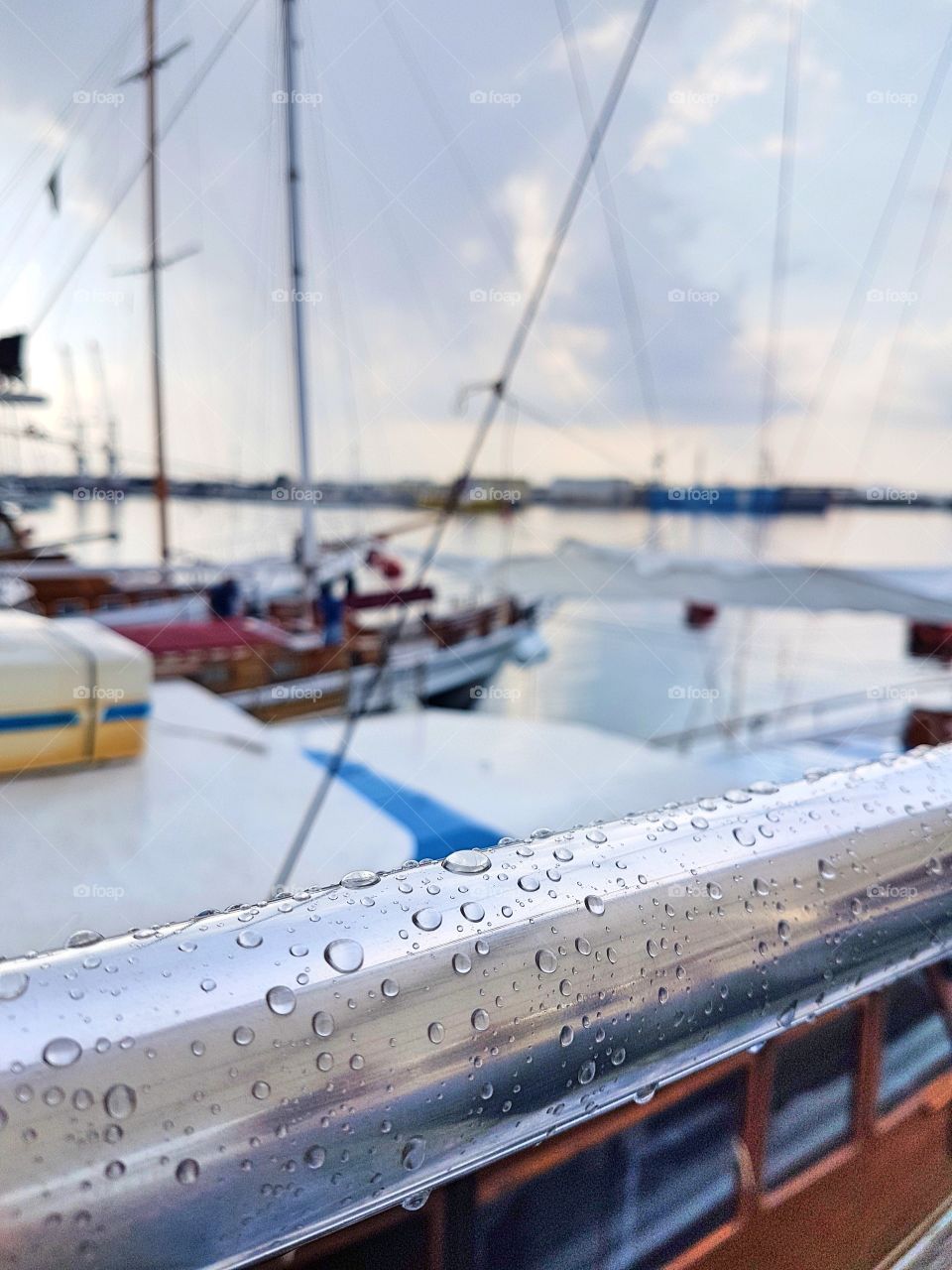 Rain, sea and boats