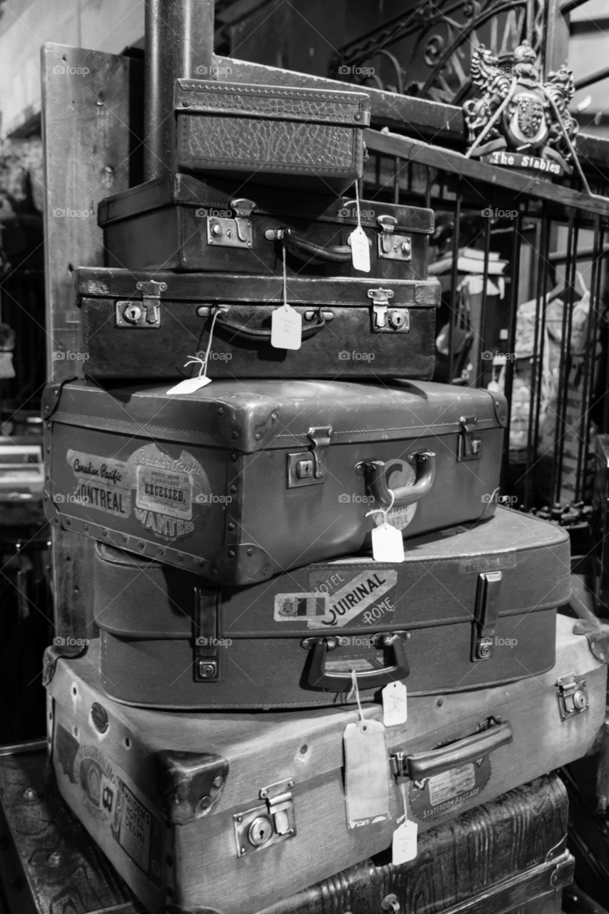luggage stack. a stack of classic suitcases in Camden market, London