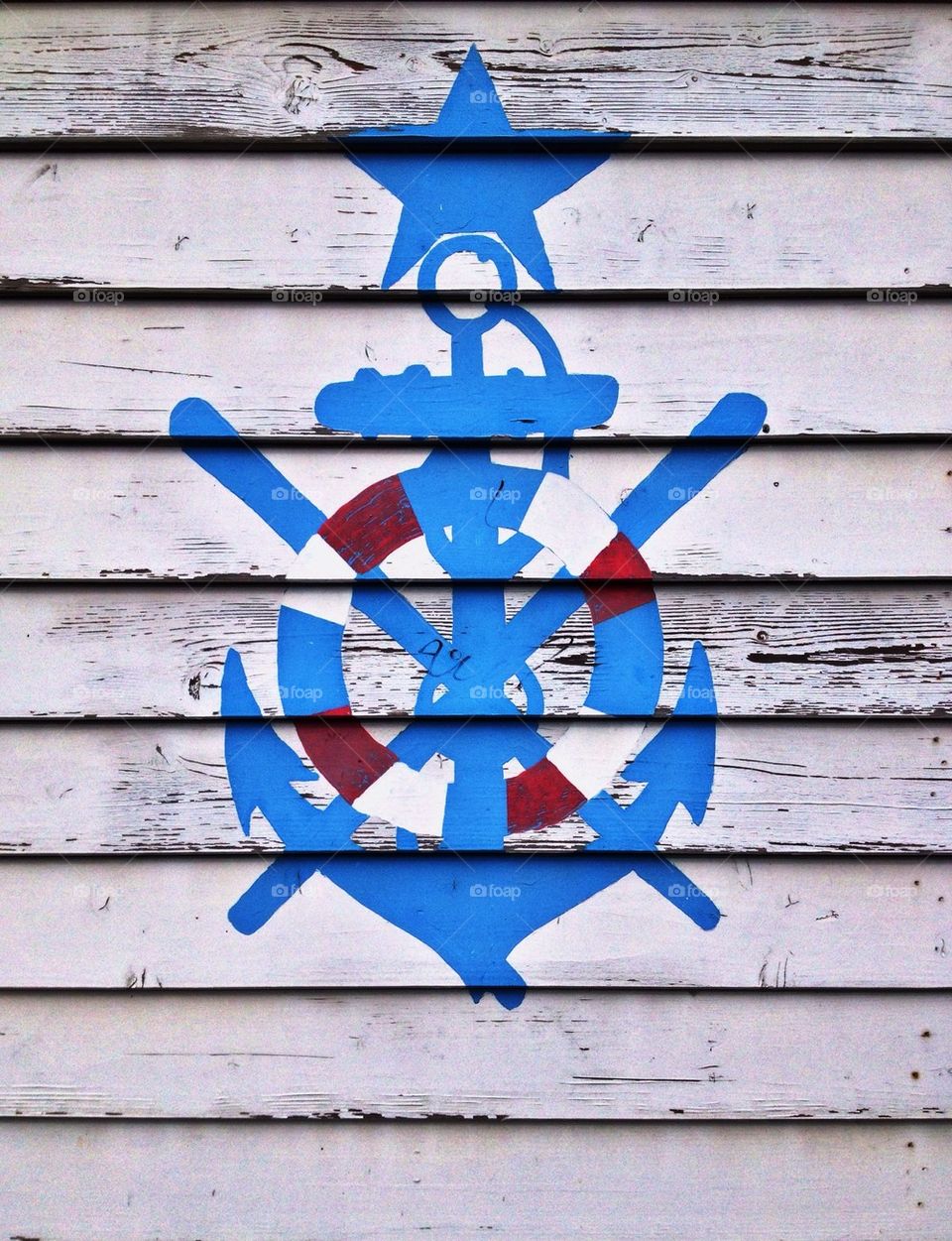 nautical symbol on wood