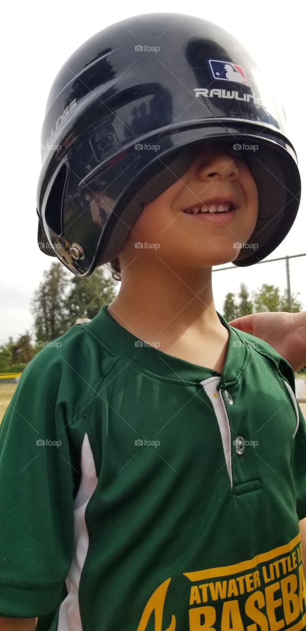 playing tee ball and learning the game with Rawling